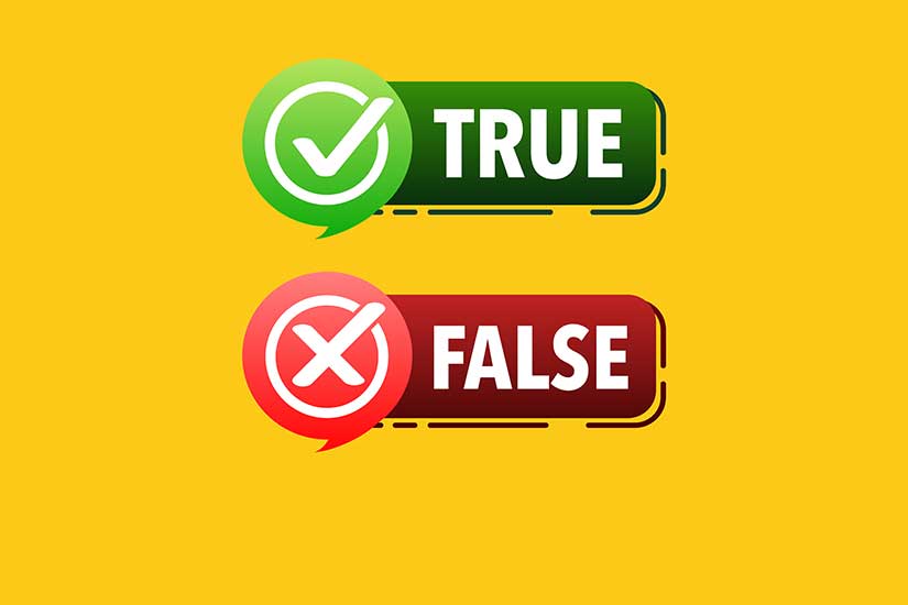 Two true/false signs on yellow background: one with 